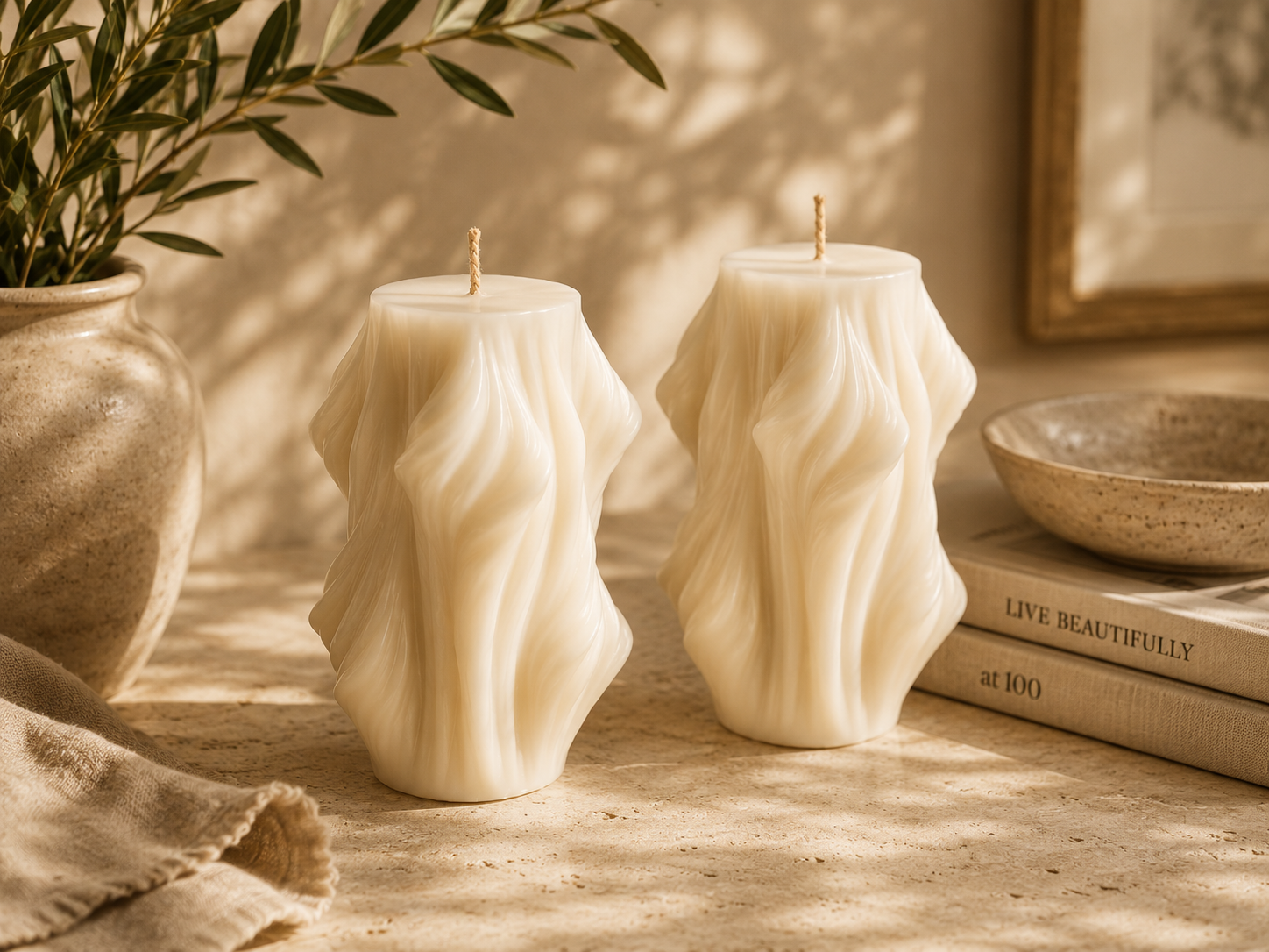 Sculptural ivory candles set of two